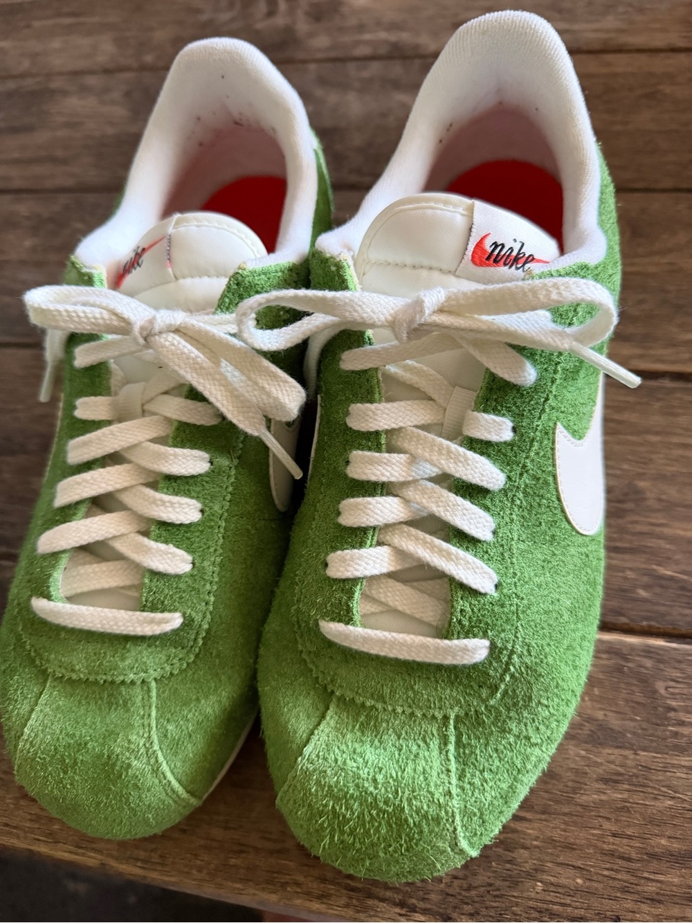 Nike woman’s Cortez Green Suede Sneakers with White Swoosh